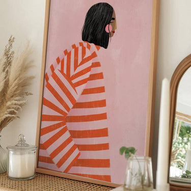 Poster Frau im orange gestreiften Mantel